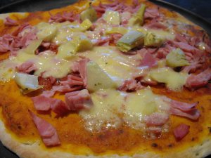 pizza with artichokes, ham and cheese pizza with artichokes, ham and cheese