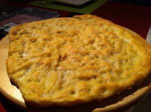 focaccia alla genovese served on large plate 
