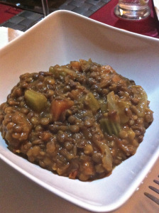 Lentils served warm lovely with some parmesan on the top