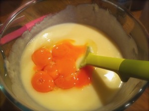add yolks to the mixture 